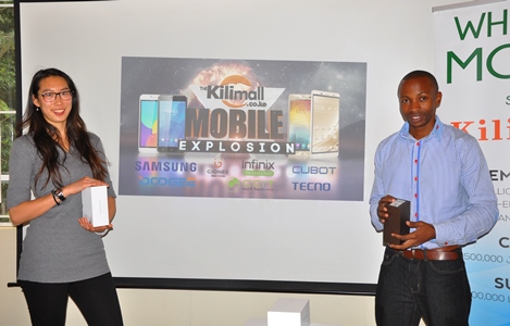 kilimall - Gladys Liu (left) of Kilimall and a colleague display some of the brands during the launch of the mobile week