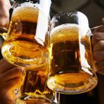 Revelers sharing a toast at a bar