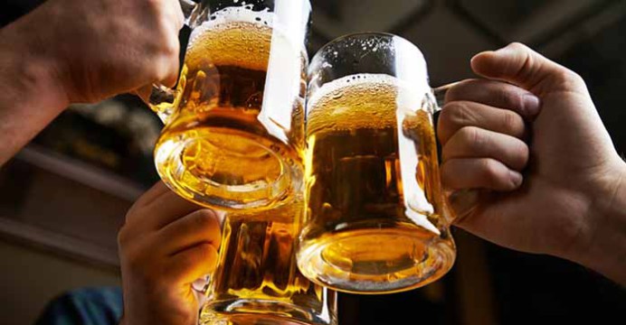 Revelers sharing a toast at a bar