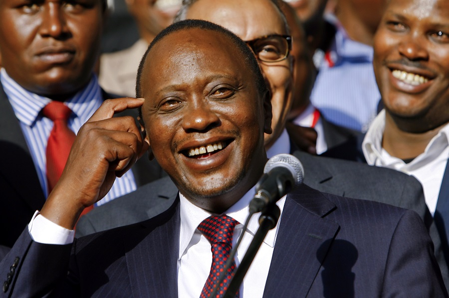 Image result for uhuru kenyatta laughing