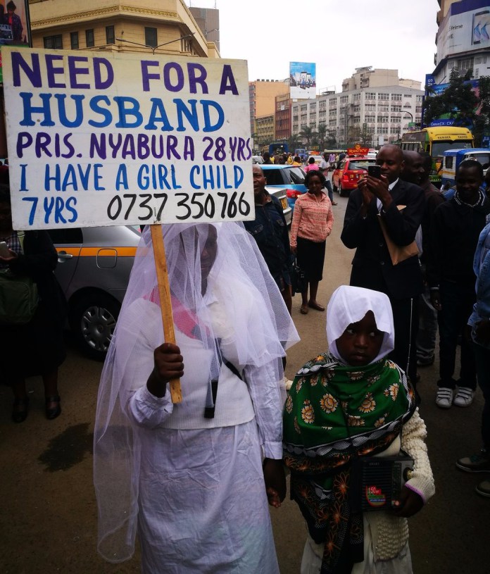 Image result for 28-yr-old single mom, Priscilla Nyambura, takes to the streets of Nairobi, Kenya, in search of a husband...