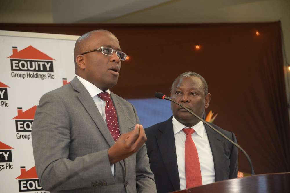 Equity Bank Group Chief Commercial Officer Polycarp Igathe (left) makes remarks during the release of Equity Group Holdings Plc 2018 half-year financial results at Equity Centre as Group Managing Director and CEO Dr James Mwangi, looks on. PHOTO / BUSINES TODAY