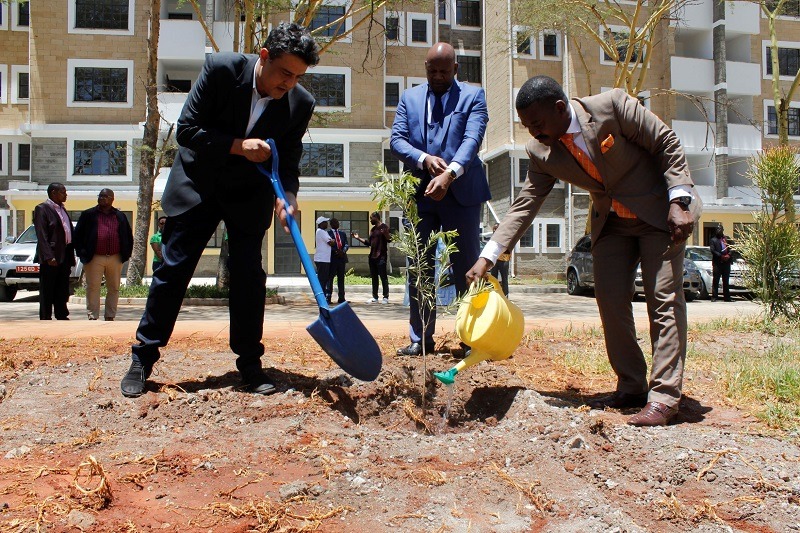 Karibu Homes Founder and Managing Director Mr. Ravi Kohli, Shelter Afrique Managing Director & CEO Andrew Chimphondah, and Shelter Afrique Chairman Daniel Nghidinua plant and water a tree to mark the launch of phase II of Karibu Homes. The housing project was funded by Shelter Afrique at a cost of Ksh 355 million. www.businesstoday.co.ke