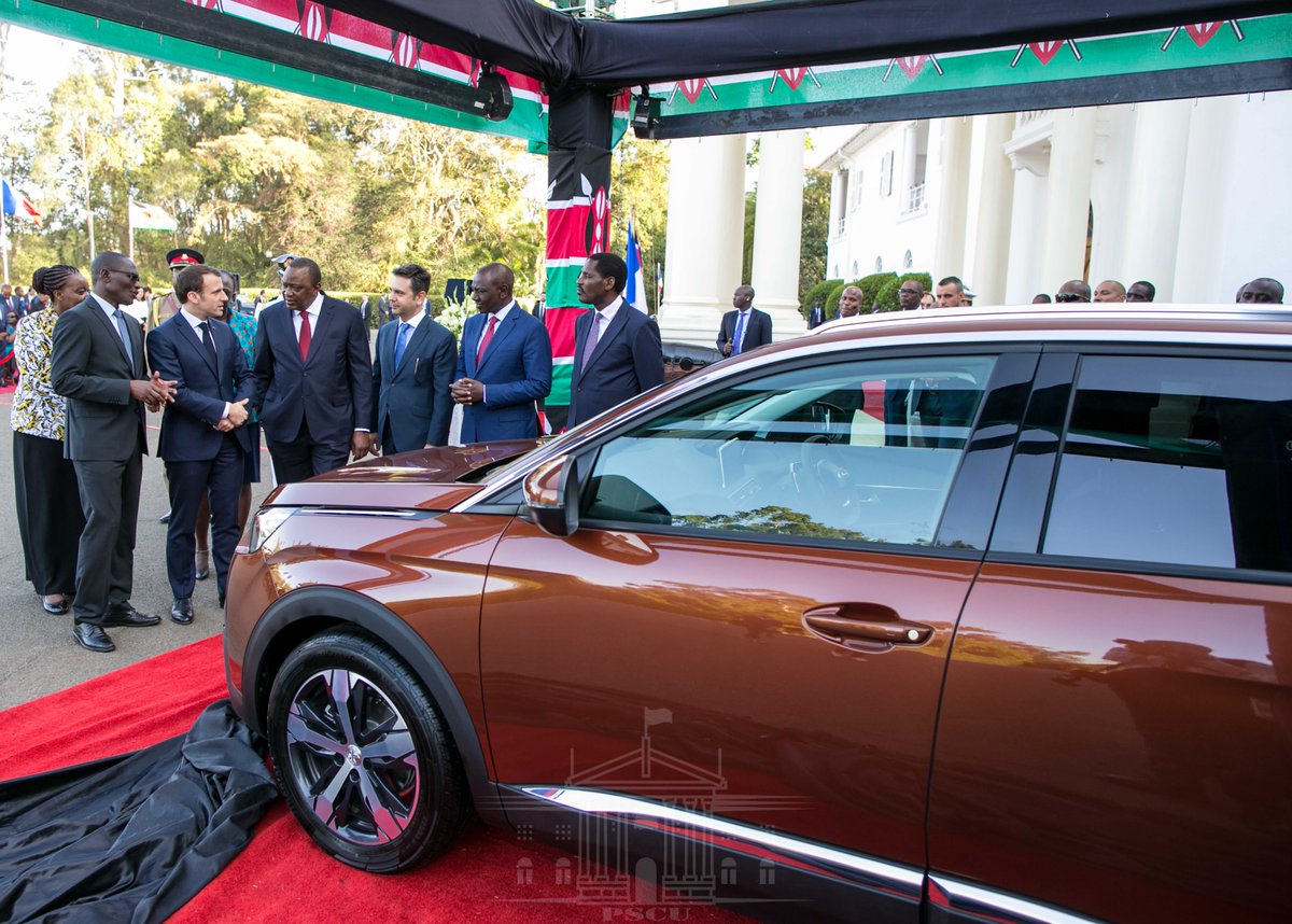 Uhuru Drives Macron In High Stakes Test Drive For Kenyan Peugeot