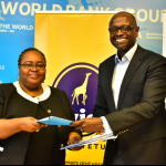 IFC Regional Director for Eastern Africa Jumoke Jagun-Dokunmu (left) exchanges documents with Twiga Foods CEO Peter Njonjo after signing an agreement between the two companies. www.businesstoday.co.ke