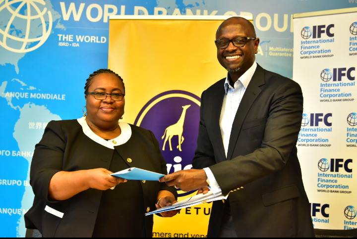 IFC Regional Director for Eastern Africa Jumoke Jagun-Dokunmu (left) exchanges documents with Twiga Foods CEO Peter Njonjo after signing an agreement between the two companies. www.businesstoday.co.ke