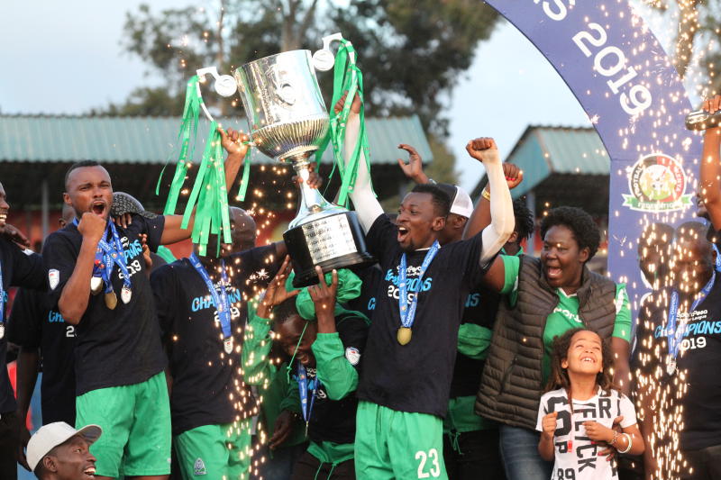 Gor Mahia players lifting the KPL trophy after emerging victorious in the 2018/19 season. www.businesstoday.co.ke