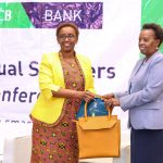 KCB Group Head of Corporate and Regulatory Affairs, Judith Sidi Odhiambo (L), presents a copy of the 2019 KCB Sustainability Report and token of appreciation to Kenya Breweries Limited Managing Director Jane Karuku during the 5th KCB Annual Supplier conference at a Nairobi hotel. www.businesstoday.co.ke