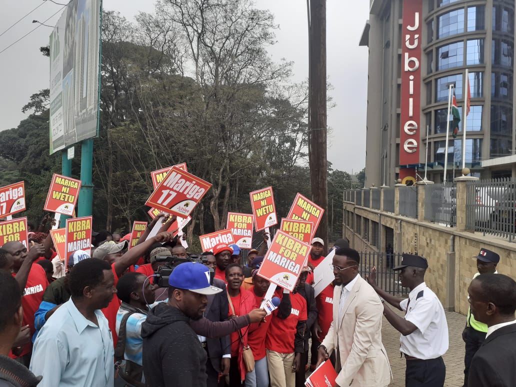 Former Harambee Stars Player McDonald Mariga with his supporters after submitting his papers at the Jubilee Party Offices. www.businesstoday.co.ke