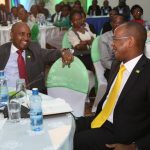 New National Bank of Kenya (NBK) MD designate Paul Russo (in red tie) and Kenya Commercial Bank (KCB) CEO Joshua Oigara. Both will be in charge as KCB concludes NBK takeover. www.businesstoday.co.ke