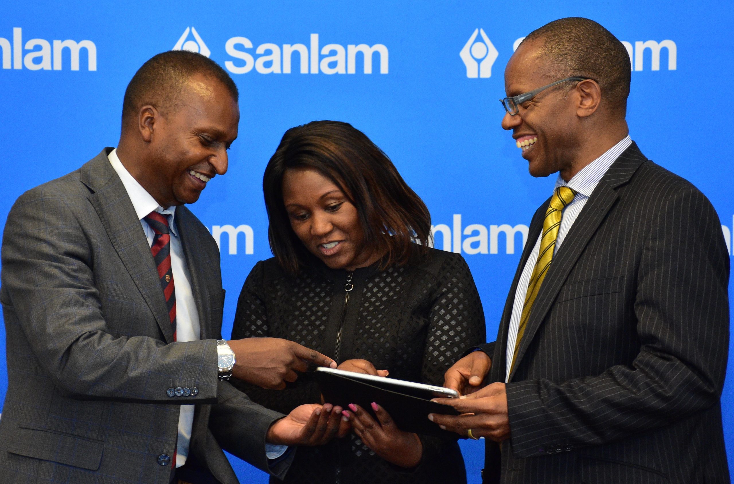 anlam Kenya Chief Financial Officer Kevin Mworia with Sanlam Life CEO Stella Njunge and Sanlam Kenya Group CEO Patrick Tumbo. www.businesstoday.co.ke