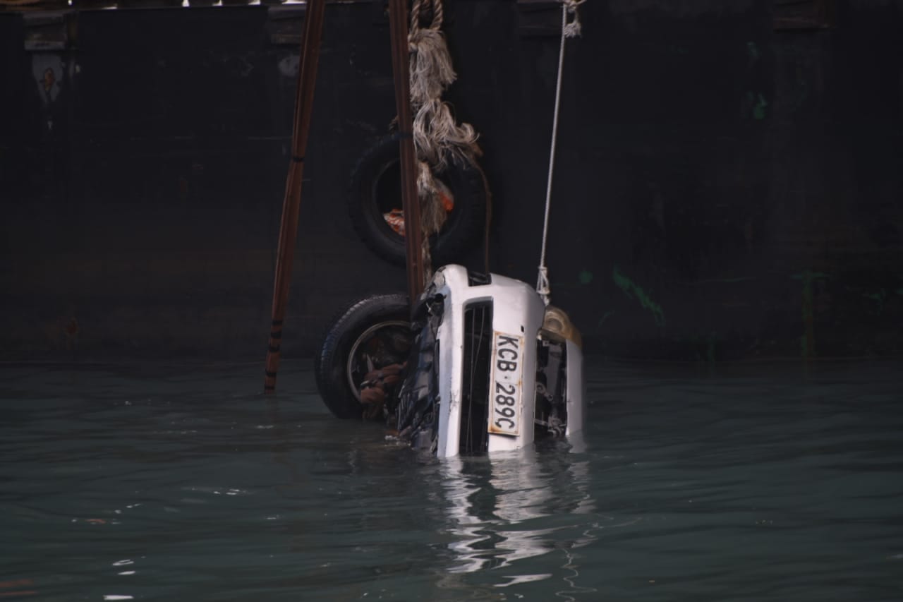 The Toyota ISIS bearing the bodies of Mariam and her daughter Amanda is lifted from the channel. The two perished in the who perished in the Likoni Ferry Tragedy. www.businesstoday.co.ke
