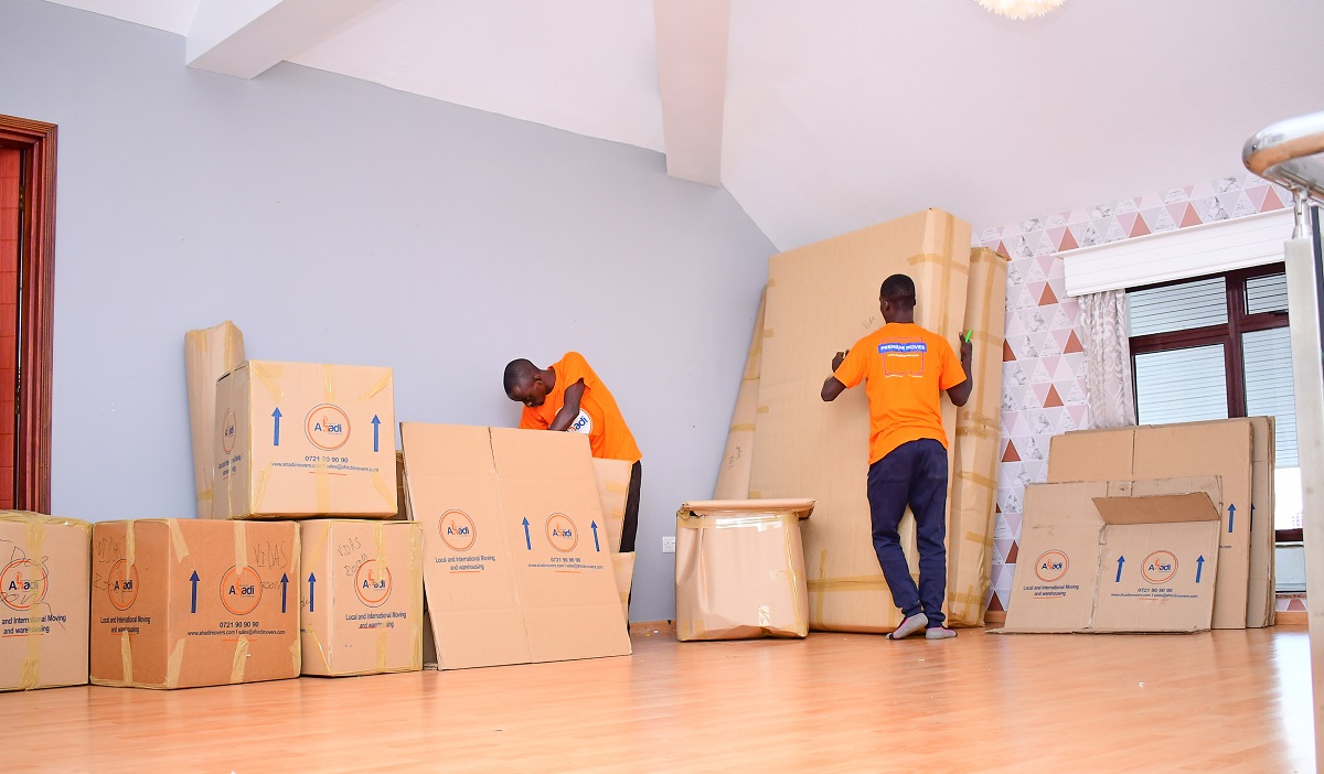 House movers packing household items. It is important to consider key factors before moving house. www.businesstoday.co.ke