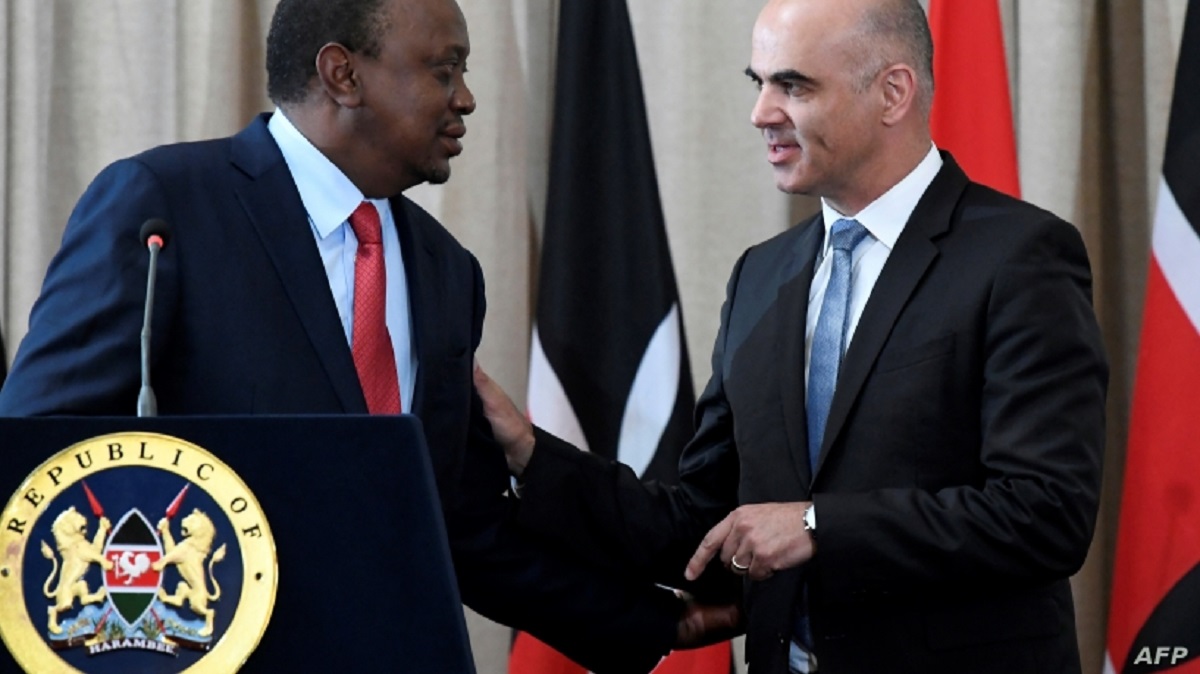 President Uhuru Kenyatta with Swiss President Alain Berset. The two signed an agreement in July last year for the repatriation of stolen wealth from Switzerland to Kenya. www.businesstoday.co.ke