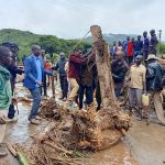 Residents removing logs that had blocked some roads. The American government has chosen to work with the Red Cross bypassing the government in giving aid to the affected residents. www.businesstoday.co.ke