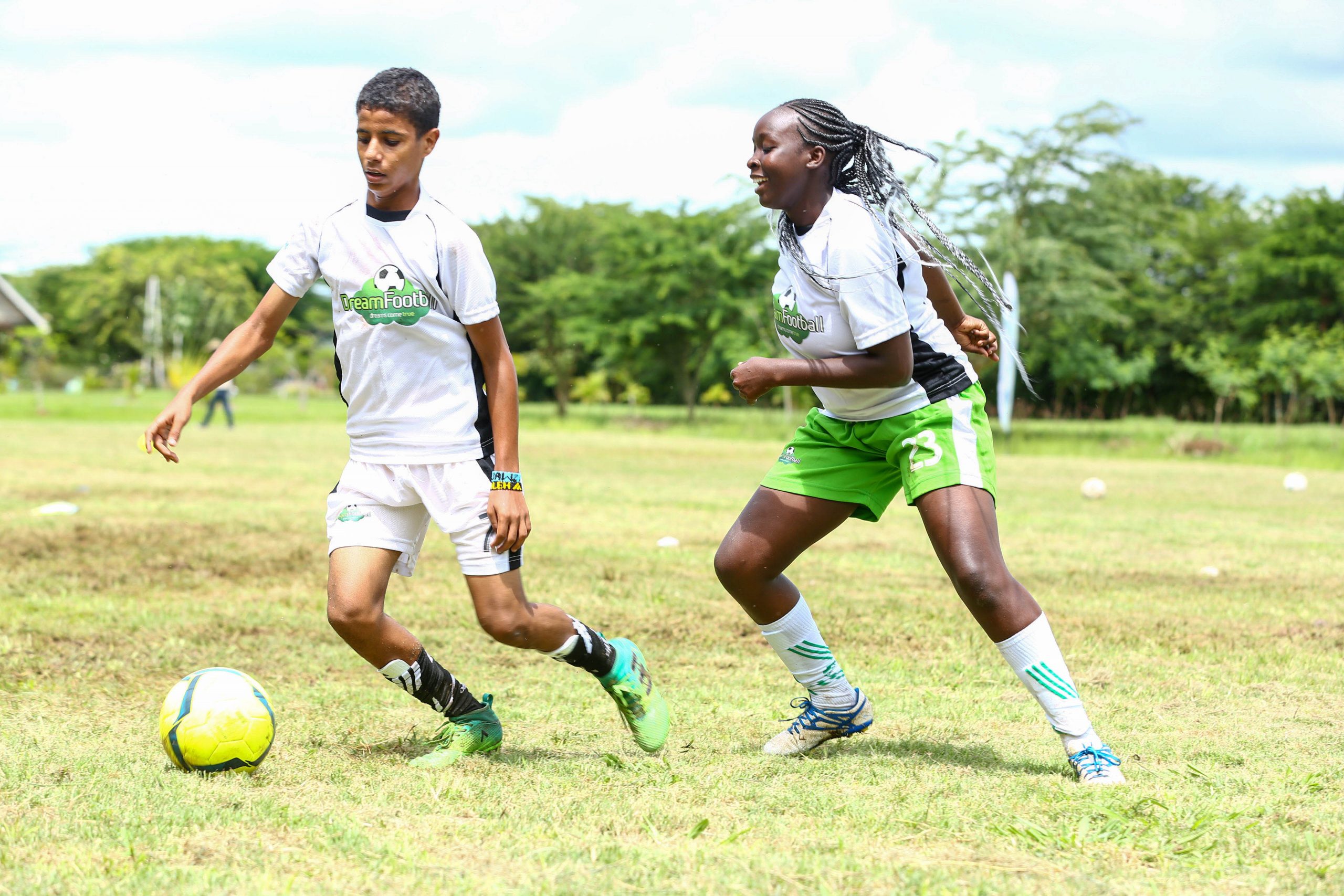 14- year- old, Swaleh Fahim, from Bahwan Muslim school (Mombasa) tackles 16- year- old, Lian Kimashia, from Maina Wanjigi Secondary School (Eastleigh) during the Dream Football Boot Camp at Ol-Donyo-Sapuk Resort. www.businesstoday.co.ke