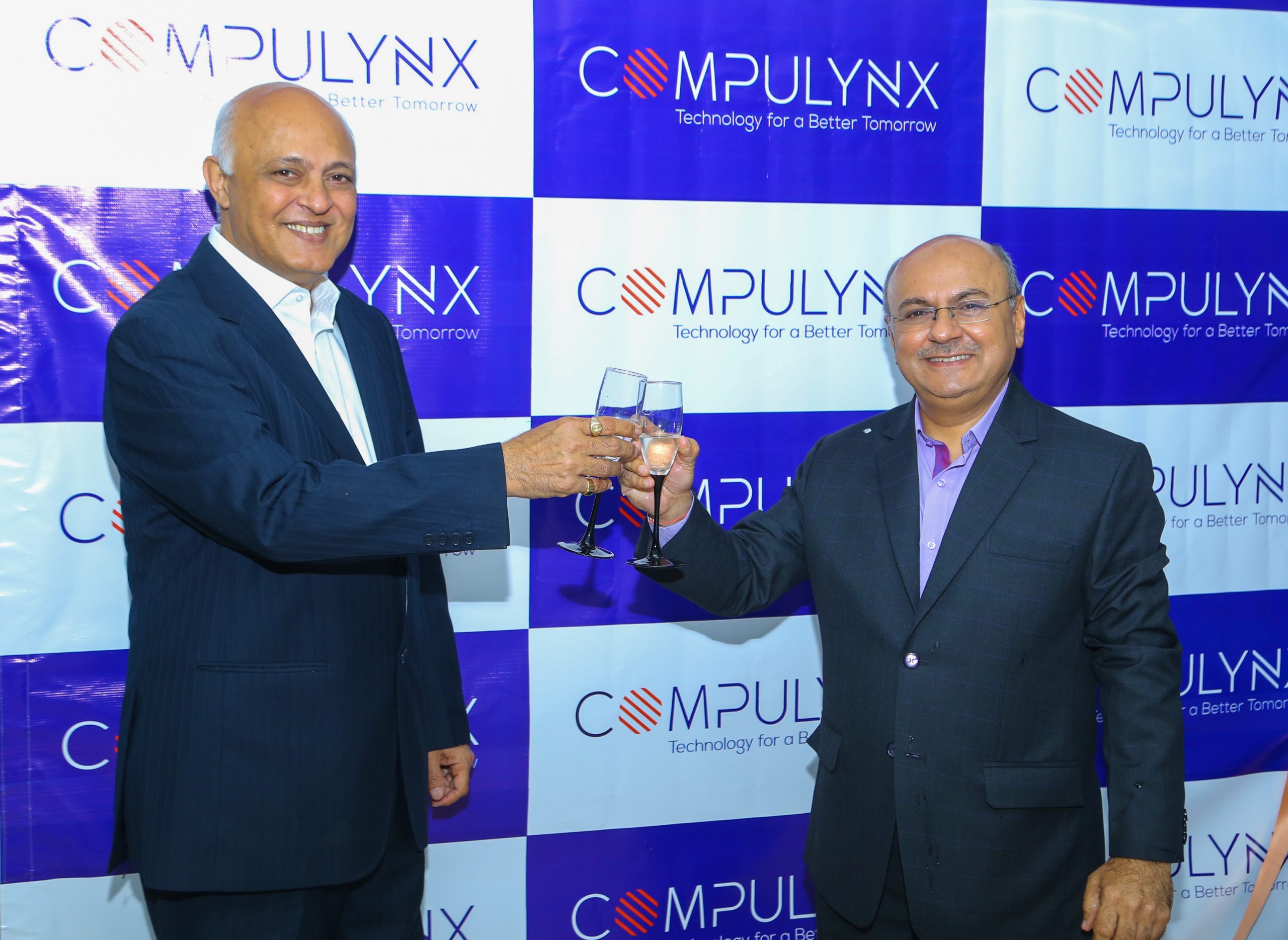 (L-R) Director of Compulynx Mehul Savani and the CEO & Founder Sailesh Savani toast to a new beginning during the unveiling of the new strategic direction for the company. www.businesstoday.co.ke