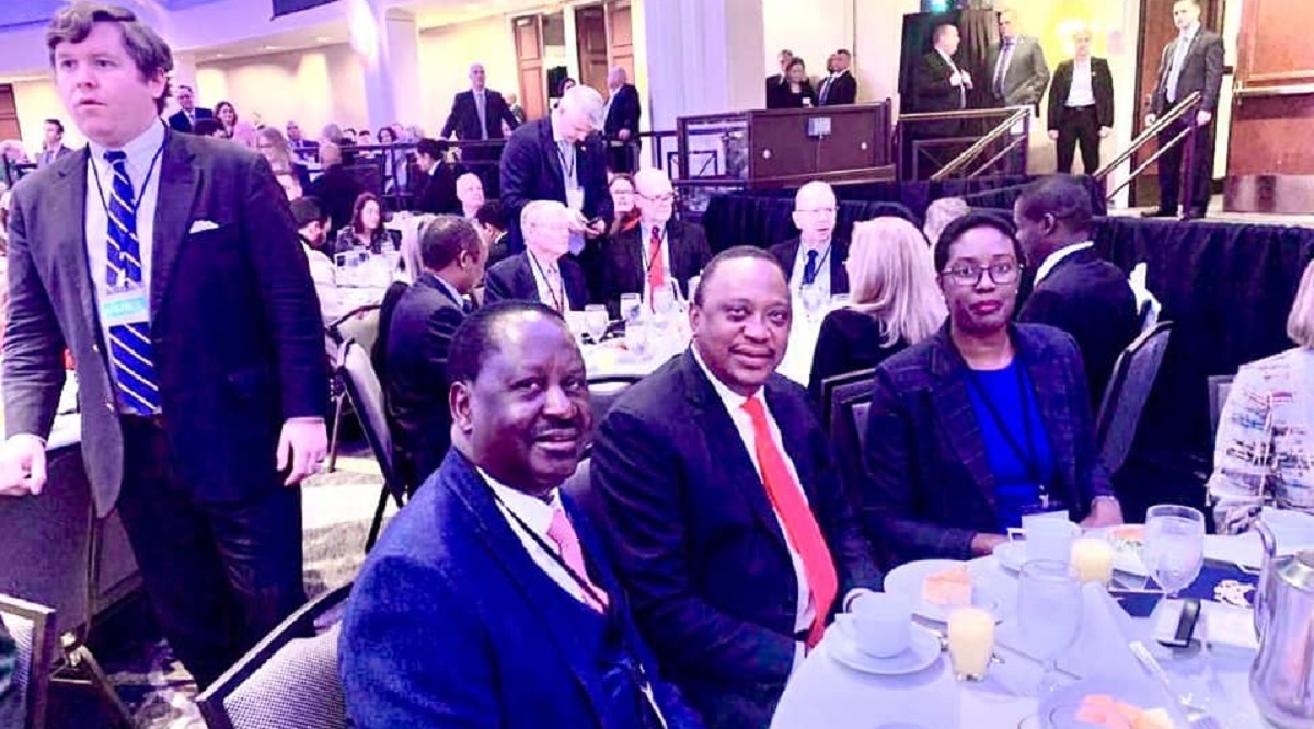 Raila Odinga with President Uhuru Kenyatta and his daughter Rosemary at the prayer breakfast in Washington DC, USA. Raila has not been able to pay his last respects to the late President Daniel Moi in person. www.businesstoday.co.ke