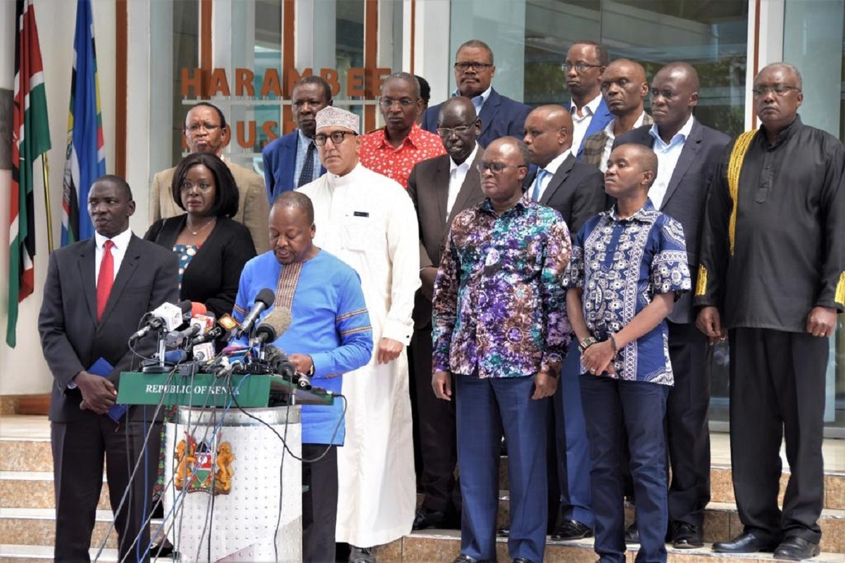 Health CS Mutahi Kagwe flanked by other CS when he announced that Kenya had confirmed its first coronavirus case in March. The Ministry has ordered 24 million doses of the vaccine.