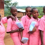 School girls with free pads. The #AchieveMoreGirl project seeks to reduce school absenteeism among adolescent girls during menstruation by promoting menstrual health and access to products. www.businesstoday.co.ke