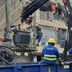 Kenya Power workers pictured undertaking repairs.