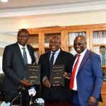 Macdonald Obudho (far right) at a hand-over ceremony