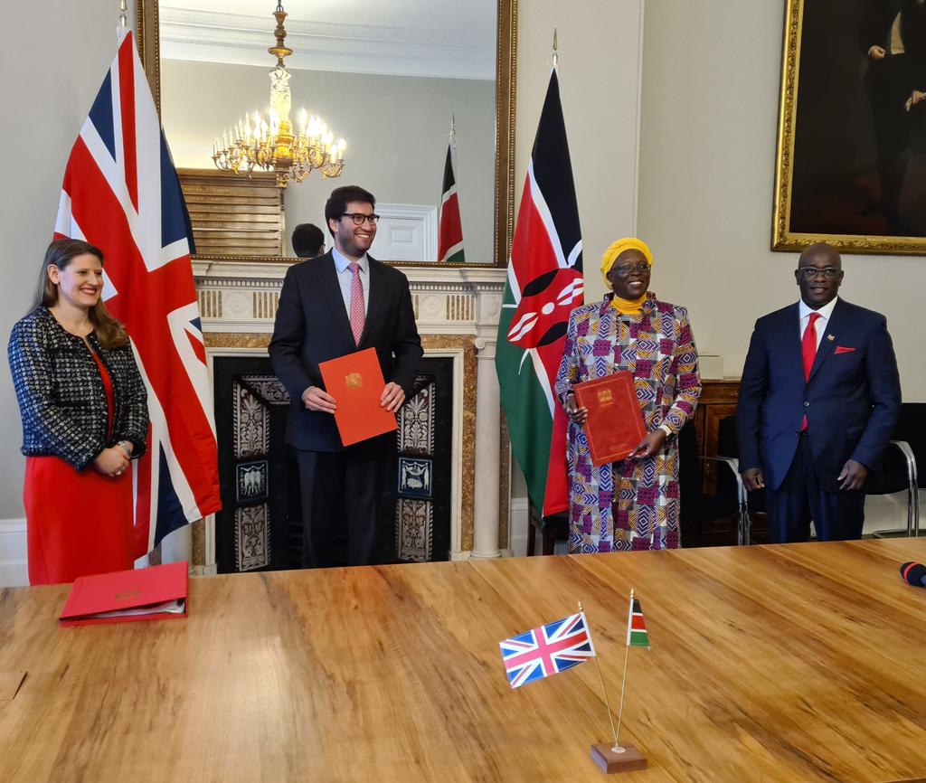 Kenya and UK officials pose after signing a free trade deal on December 8, 2020