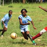 Girls playing football for Moving the Goalposts (MTG), a women's rights organization in Kilifi County. MTG is featured in Facebook's 'Real People Real Stories' campaign.