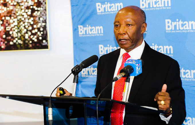 Britam CEO Benson Wairegi addressing a past press conference