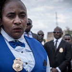 Private detective Jane Mugo pictured with her team in a BBC documentary