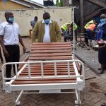 Mungai Gathogo (right) taking Presidential Delivery Unit (PDU) officials through their beds in July 2020.