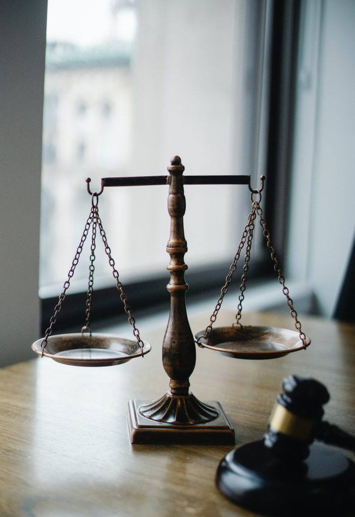 Image of a gavel and a scale 