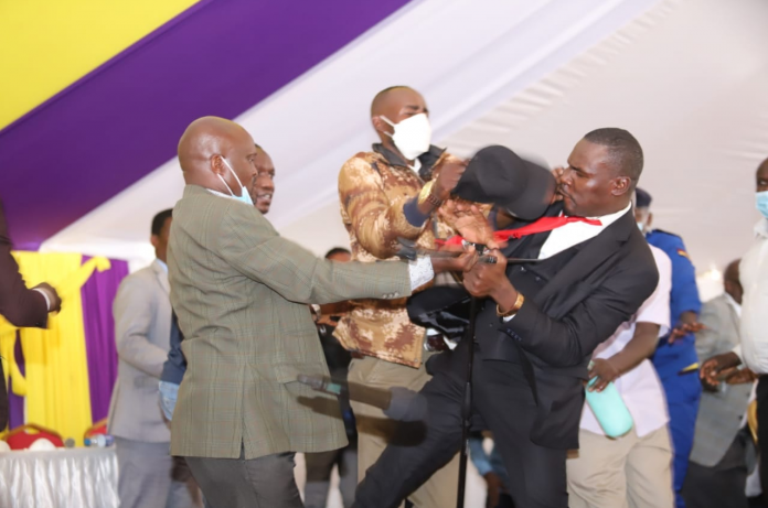 Mps fight at funeral Mps fight at funeral