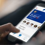 A PayPal user looks at the mobile app on their smartphone. Kenyan users of the payments service, mostly freelancers, are up in arms over its controversial holding of payments.