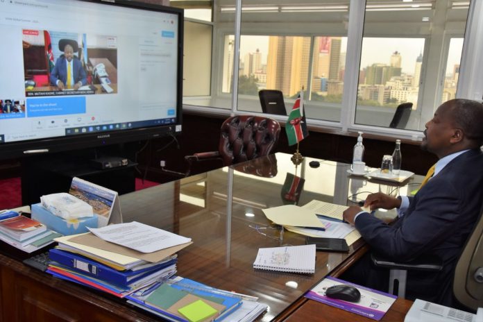 Health Cabinet Secretary Mutahi Kagwe attending a past virtual meeting from his office.