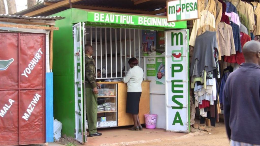 Customers at an M-Pesa agent outlet in Nairobi