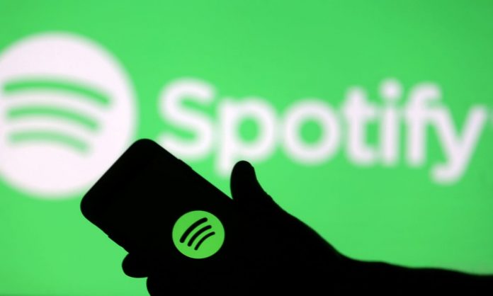 The Spotify logo seen on a mobile device. The firm is set to expand into new markets including Kenya.