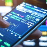 A trading platform displayed on a mobile device. Retail investing is experiencing a surge in popularity after the Reddit-Gamestop saga shocked financial markets.