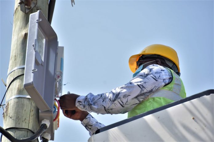 Kenya Power CEO Bernard Ngugi launching a smart metering project in January. He has promised reduced power bills as the firm reviews its contracts with electricity generating companies.