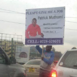 A job-seeking graduate waves a placard on the streets of Nairobi. Helb has opposed amendments to the Helb act seeking to cushion unemployed graduates from fines.
