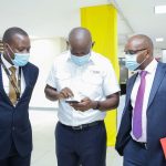 The Managing Director of National Bank of Kenya, Paul Russo (right) with Amref Flying Doctors CEO, Stephen Gitau during the launch of Maisha Cover Emergency Service in partnership with Amref Flying Doctors. Looking on is NBK's Head of Change Management, Fred Kioko.