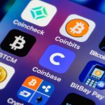 The Coinbase app logo displayed on a mobile device. It launched its initial public offering (IPO) on the Nasdaq under the symbol COIN on April 14, 2021.