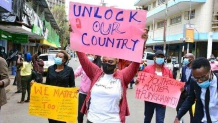 Protesters on the streets of Nairobi call for the easing of lockdown restrictions on March 31, 2021. The Kenya National Chamber of Commerce and Industry (KNCCI) has separately called for fresh stimulus and tax cuts to cushion Kenyans.