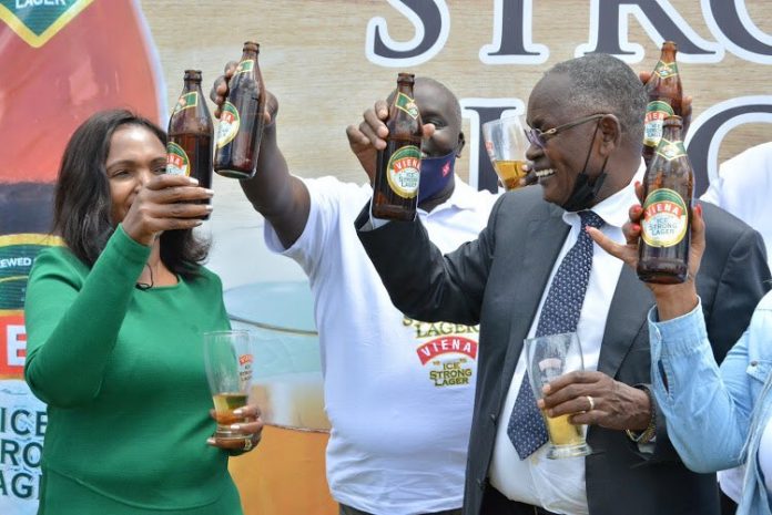tabit Tabitha Karanja (left) and her husband Joseph Karanja launching the Vienna Ice Strong Lager brand on April 27, 2021. Formulation of the product was informed by market research by Keroche which revealed dominance of imports in the strong beer segment.