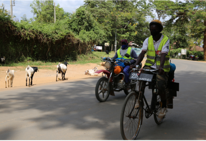 Fredrick Ochieng cycles on Covid-19 campaign