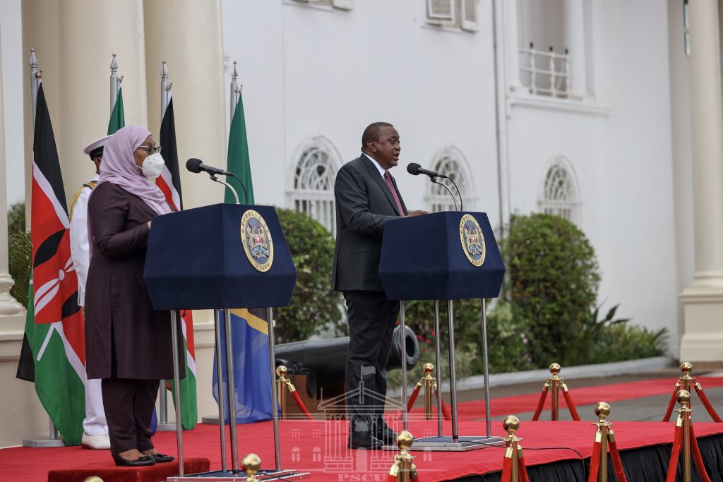 Presidents Samia Suluhu and Uhuru Kenyatta address a joint press conference on May 4, 2021. They agreed to eliminate barriers to smooth trade flows between the two countries.