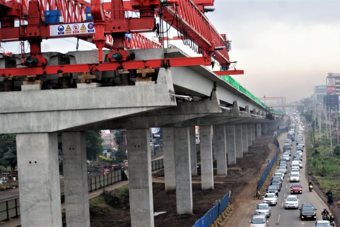 SONY DSC A section of Nairobi with construction of the Expressway in the background. The online construction approval platform is to be upgraded in the next financial year ending June 30, 2022.