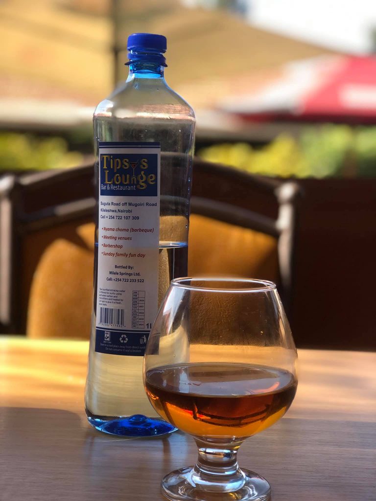 A Tipsy's branded water bottle pictured at the restaurant. Other than the bar and lounge, it includes a spacious garden area ideal for events.