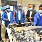 Georgina Oginga (R) talk to Plan International Director Patrick Ngenga, Salvador Caetano Collins Okoth,Michael De Souza, NITA Board Wilson Ngahu at launch of Hyundai Dream Centre