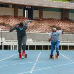 Mark Otieno sprints with Safaricom CEO Peter Ndegwa after the telco unveiled a sponsorship for the Tokyo Olympics-bound athlete in Nairobi, Kenya on July 13, 2021.